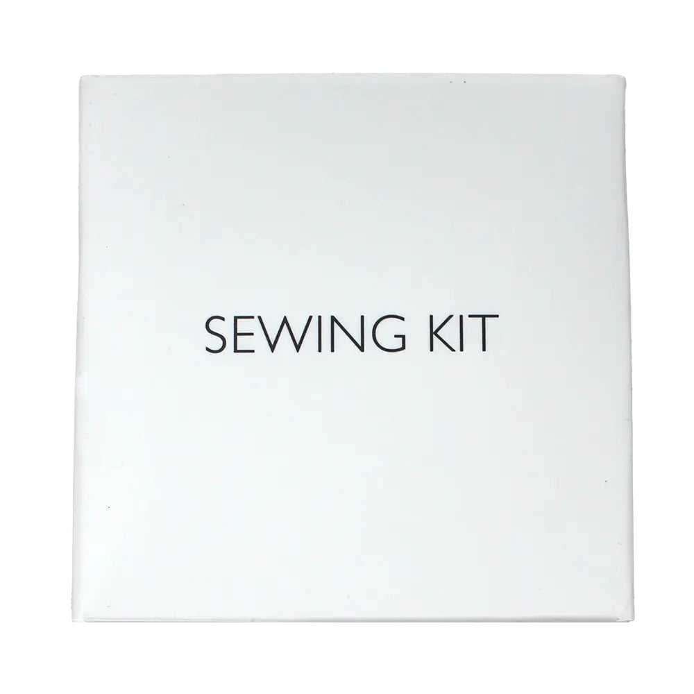 White box with 'SEWING KIT' text on a white background