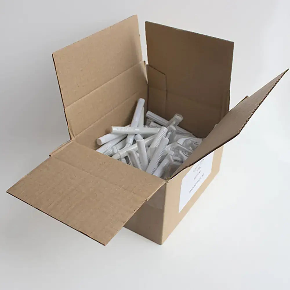 Cardboard box filled with 50 white plastic Disposable Razors