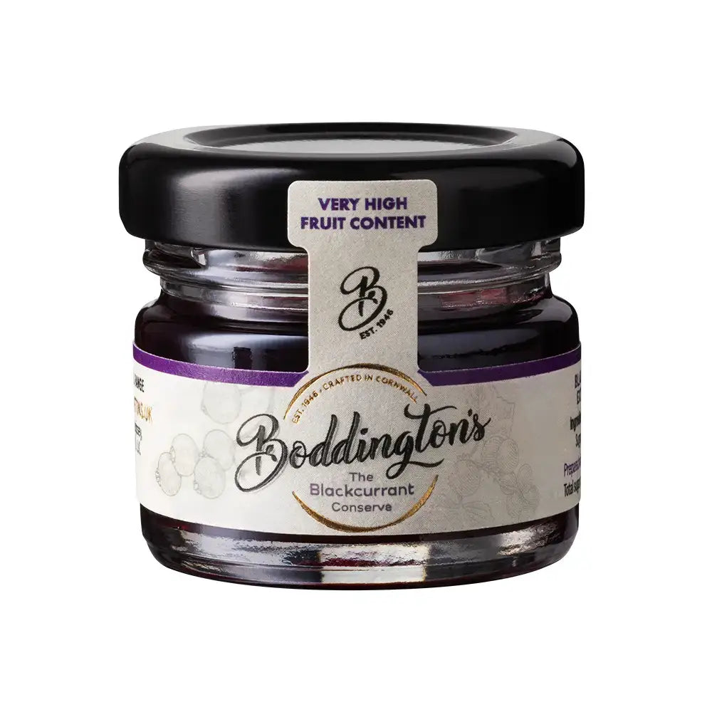 Jar of Boddington's Blackcurrant Conserve with a black lid on a white background