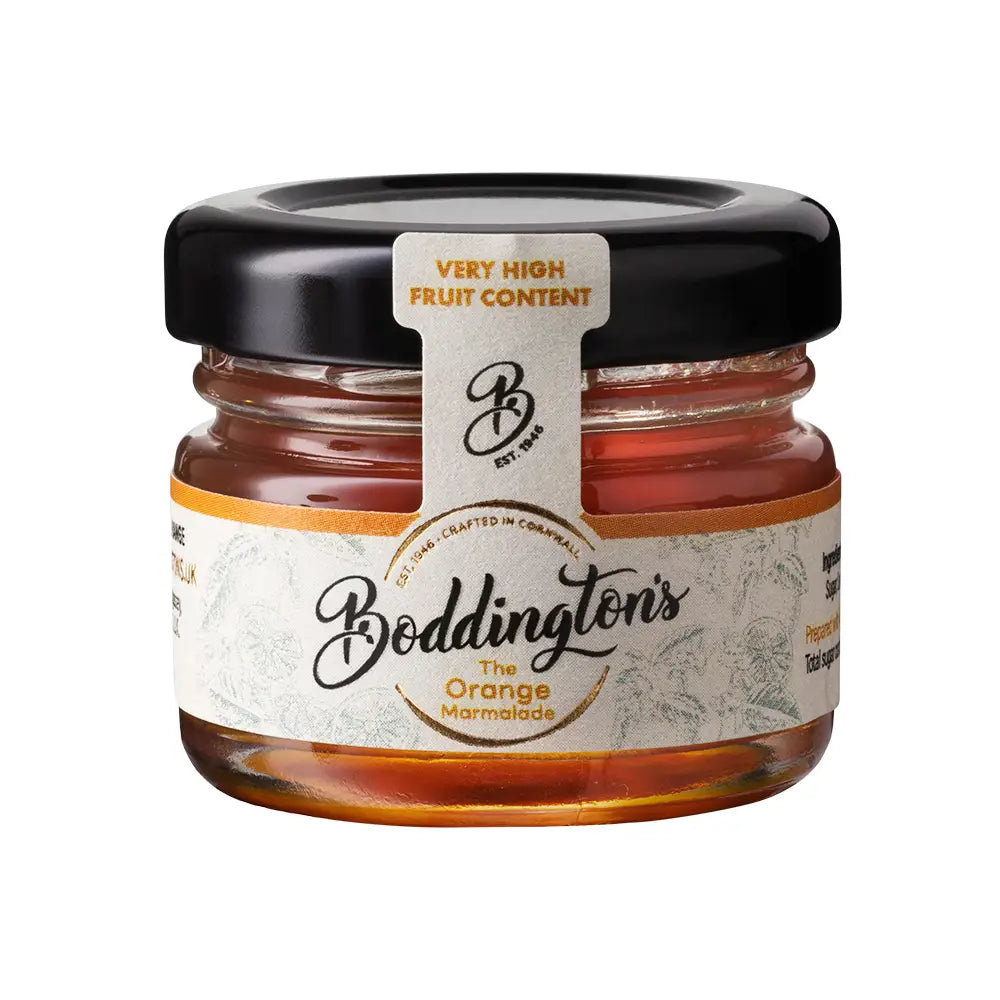 Jar of Boddington's Orange Marmalade with a black lid on a white background