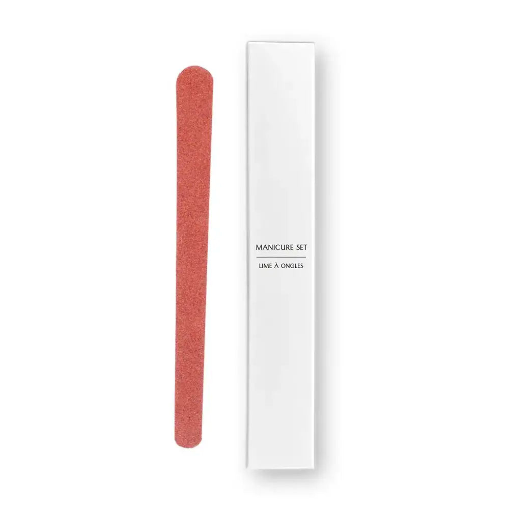 Manicure set with a white and blue nail file and a white box labelled manicure set on a white background