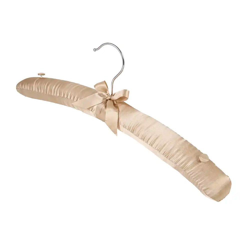 Beige garment hanger with a bow on a white background