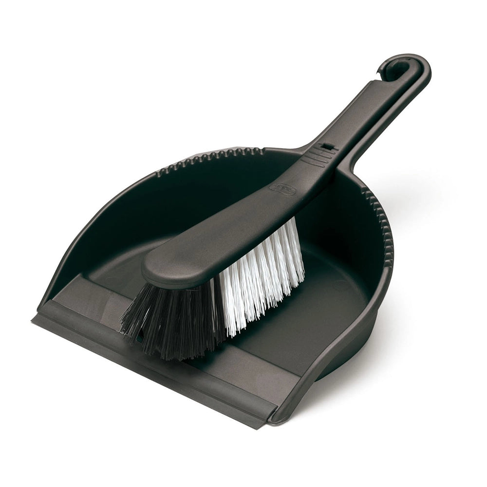 Black dustpan and brush set on a white background
