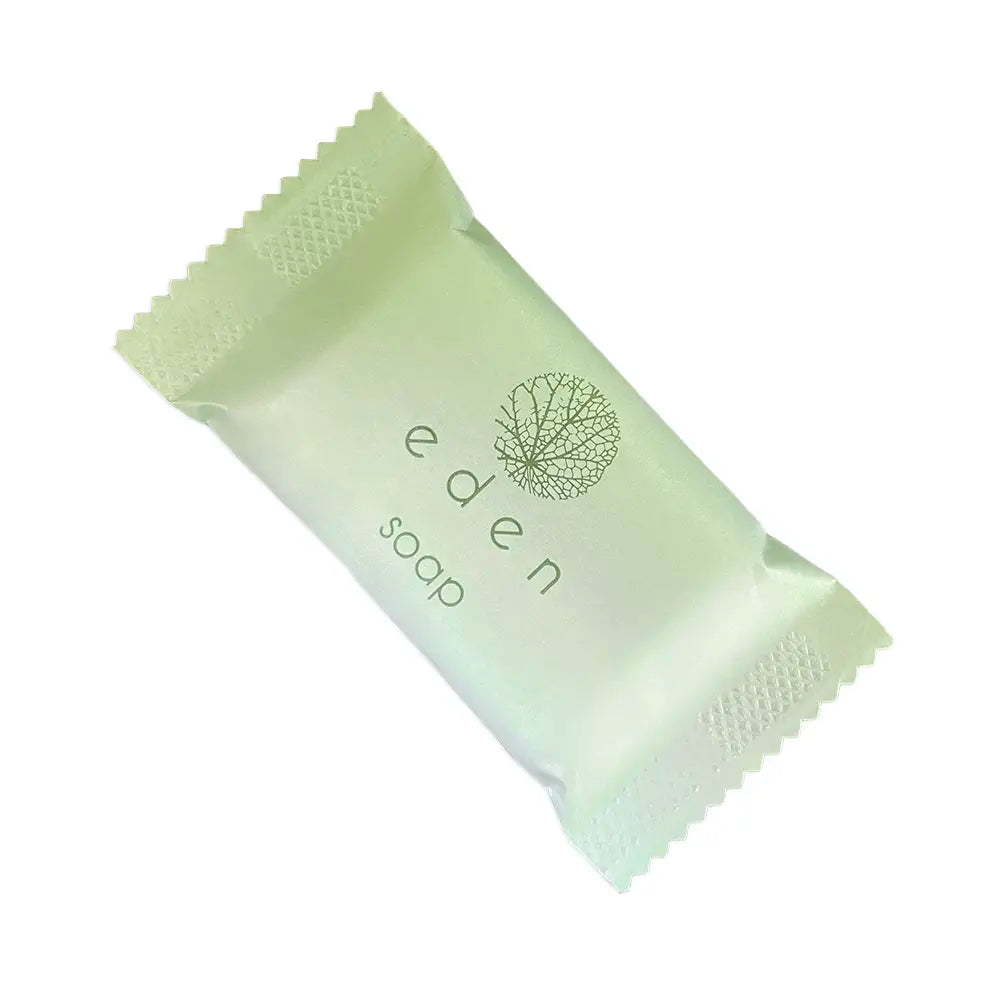 Green packaged bar of soap on a white background