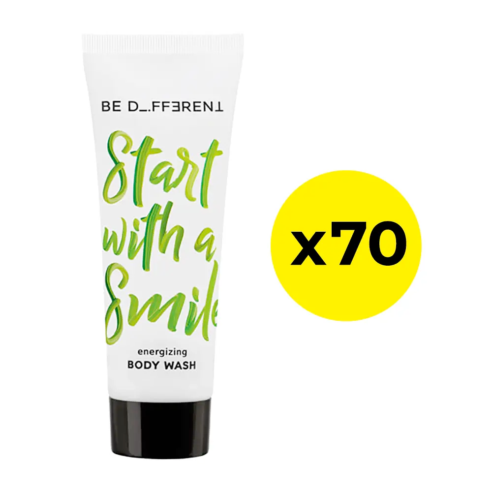 Body wash tube with text 'Start with a Smile' and 'Be Different' branding on a white background.