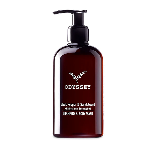 Bottle of Odyssey black pepper, sandalwood with Geranium essential oil shampoo and body wash with pump on a white background