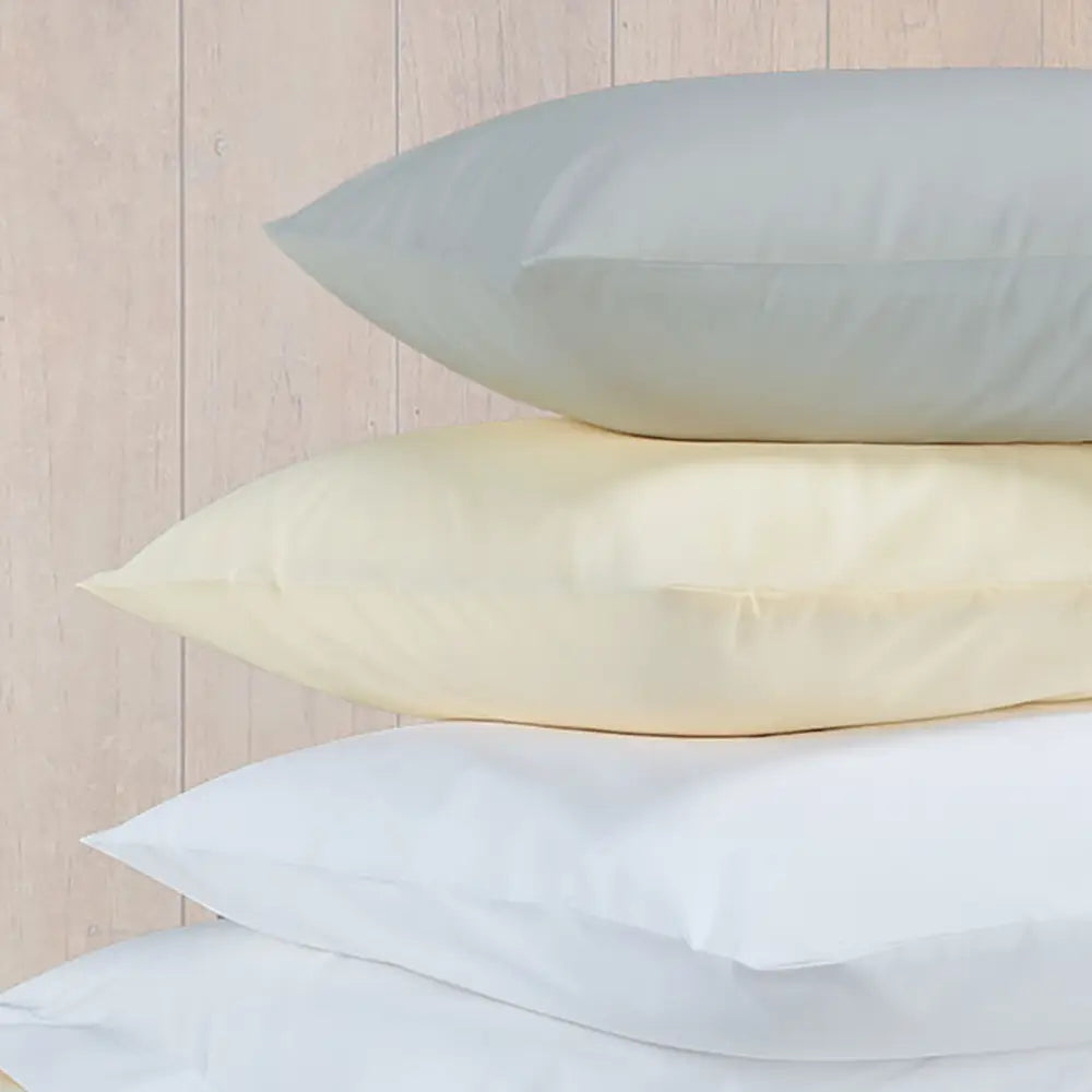 Image featuring Easy-care Percale Oxford Pillowcase - Pair - White, beige and Ivory pillows in a pile