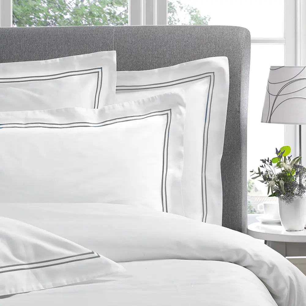 Corded Oxford bedsheets on a bed