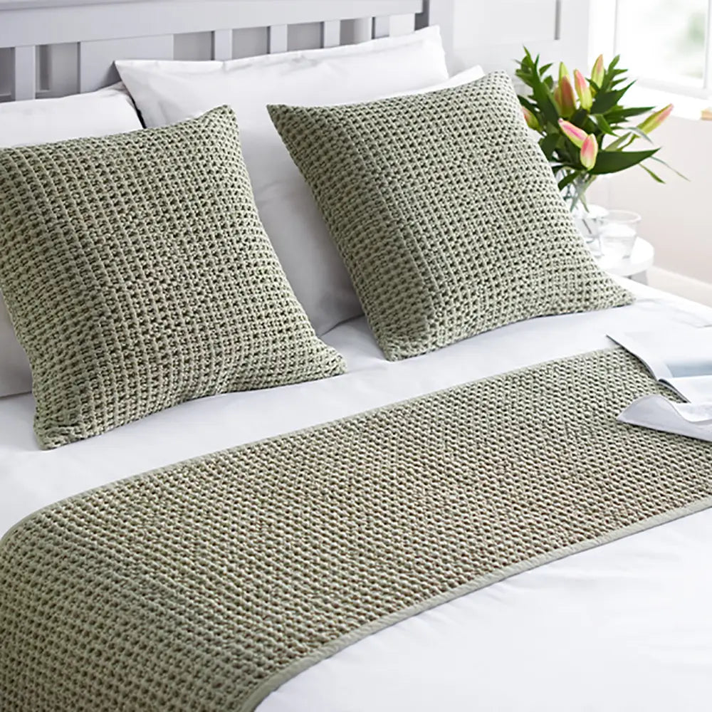 Sage green Hampton bedding runner - honeycomb weave - in lifestyle setting