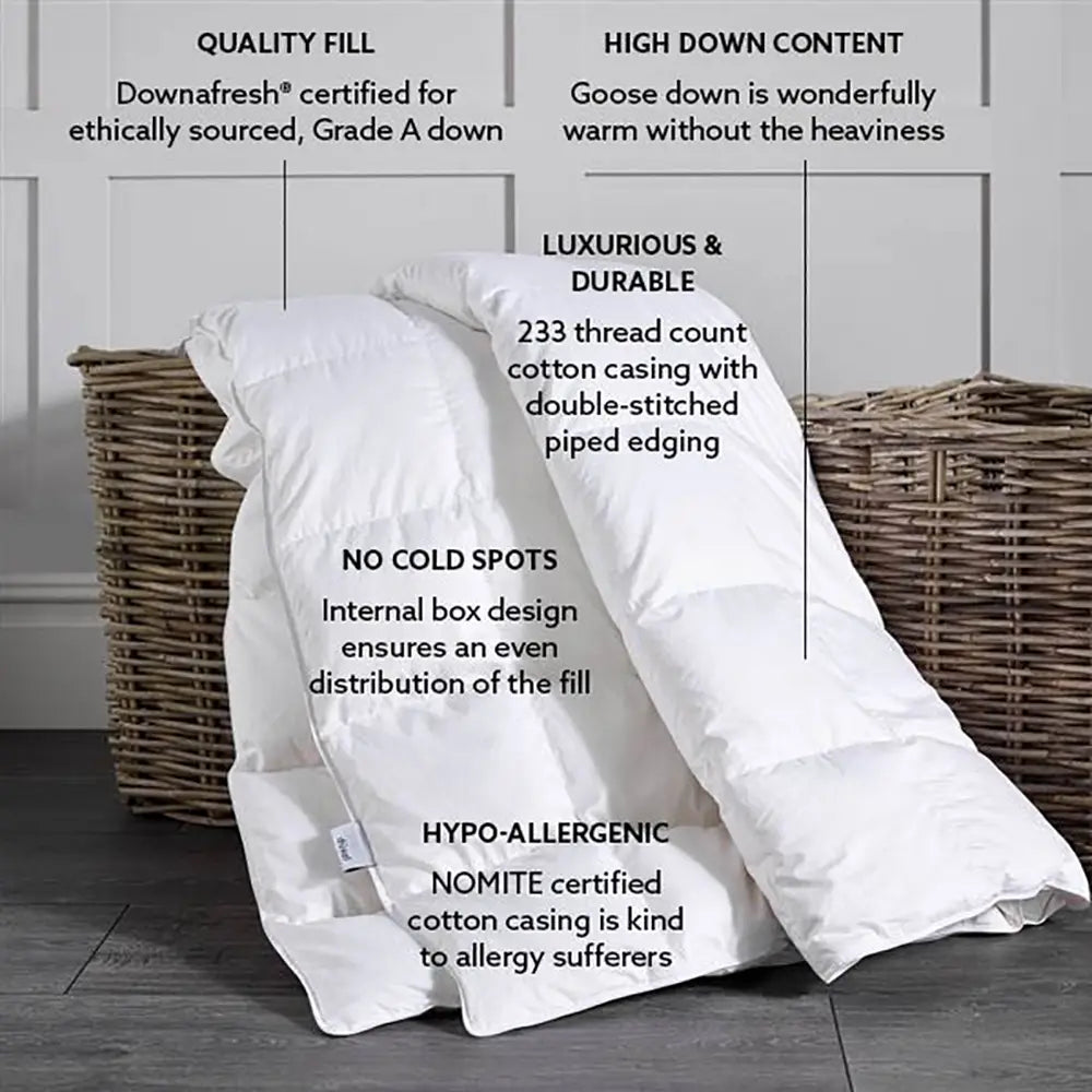 Luxury Goose Down Duvet comforter with features listed on a wooden floor.