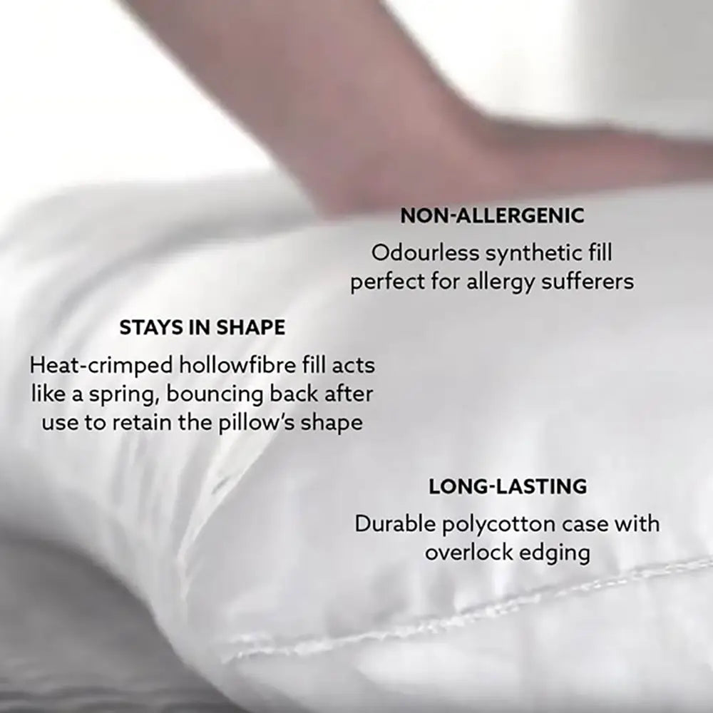 White pillow with text highlighting features like non-allergenic, shape retention, and durability.