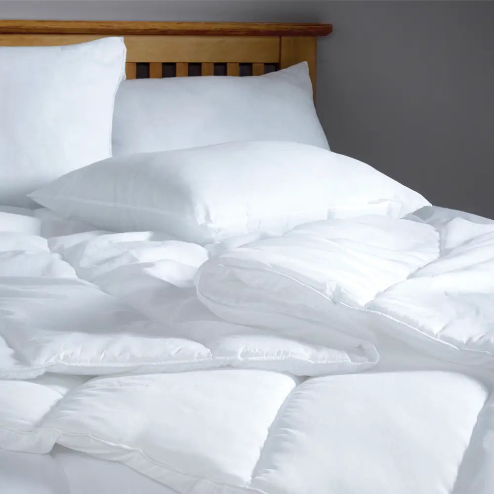 Easy care hotel pillow in lifestyle setting