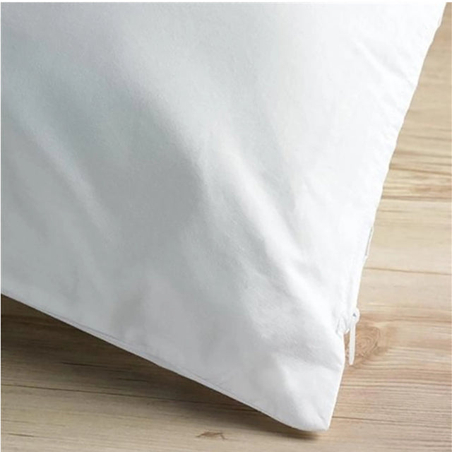 Cotton zipped pillow protector showing corner and zip closure