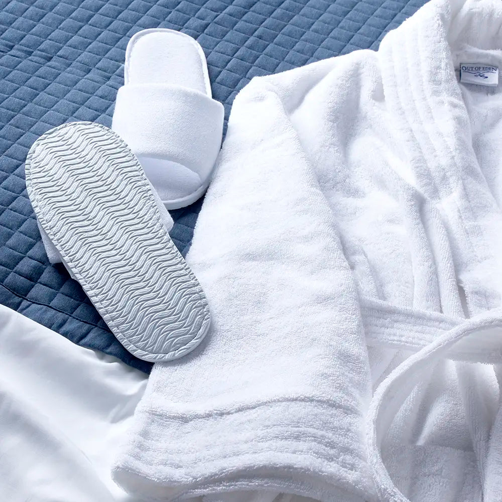 Terry Slipper with Non-Slip EVA Sole Open Toe in lifestyle setting with towel robe