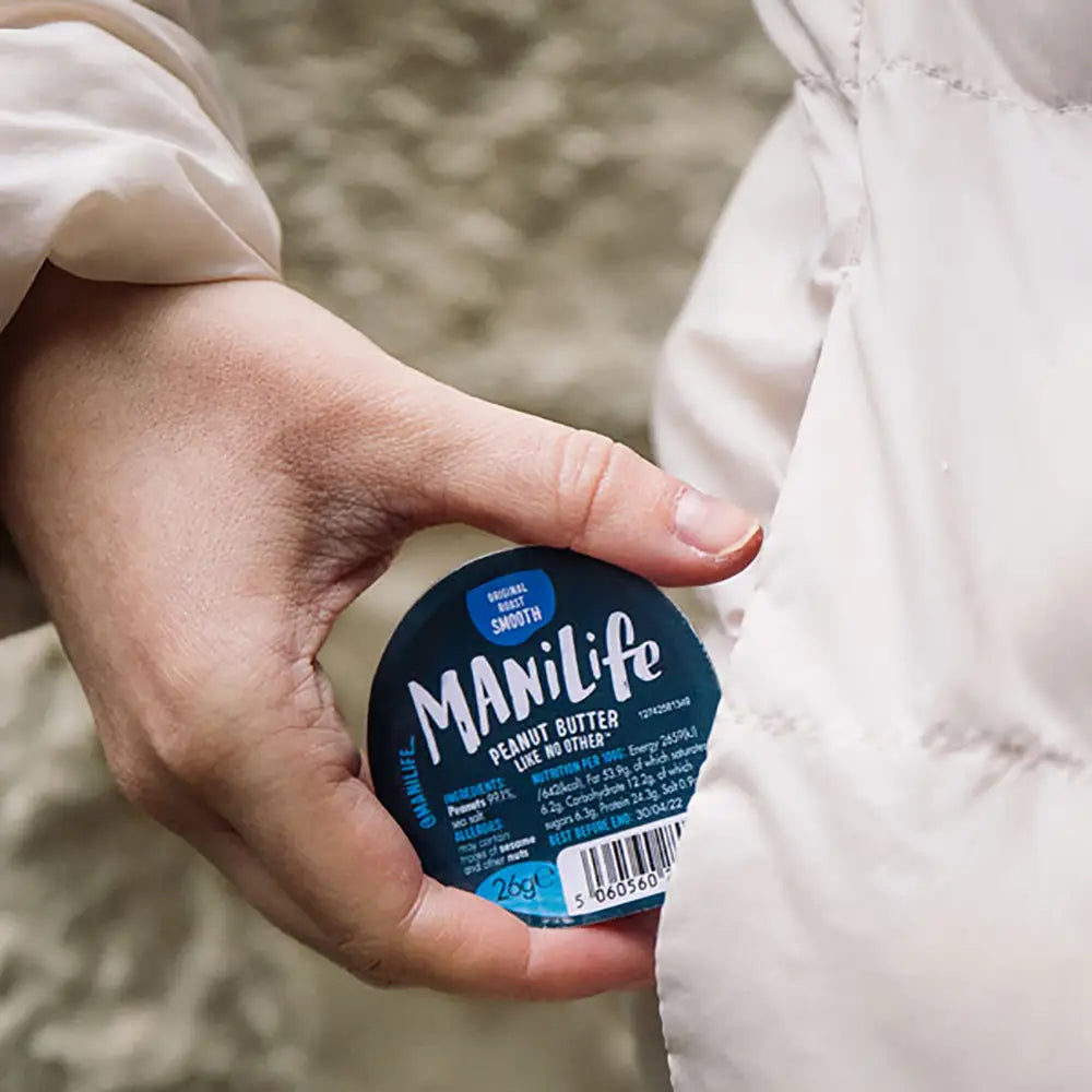 4195-48-Manilife-Smooth-Peanut-Butter lifestyle being stored in a pocket