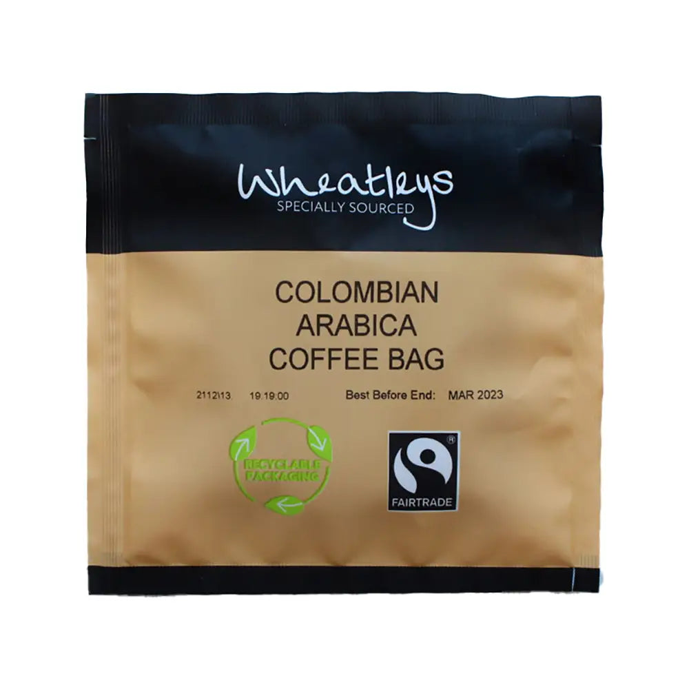 Wheatleys Colombian Arabica coffee bag with Fairtrade certification on a white background