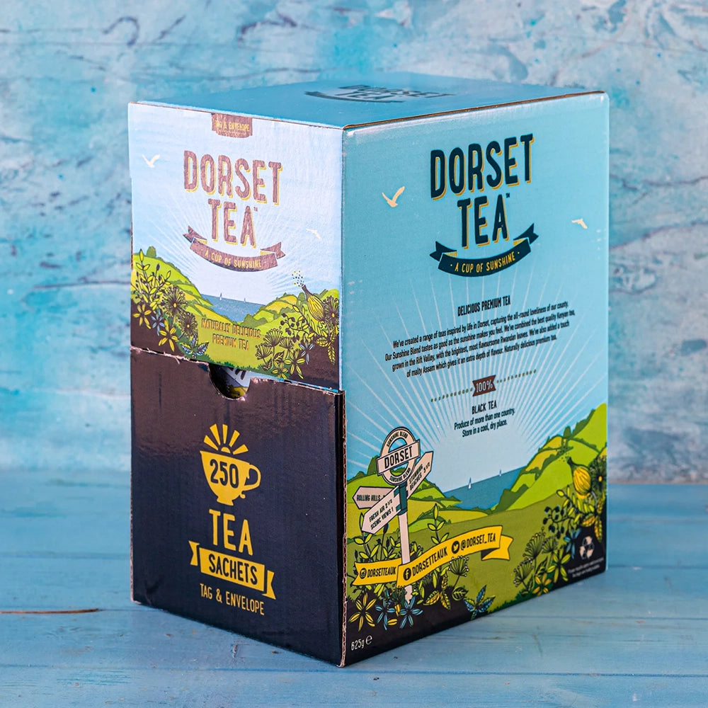 Dorset Tea packaging on a blue wooden surface