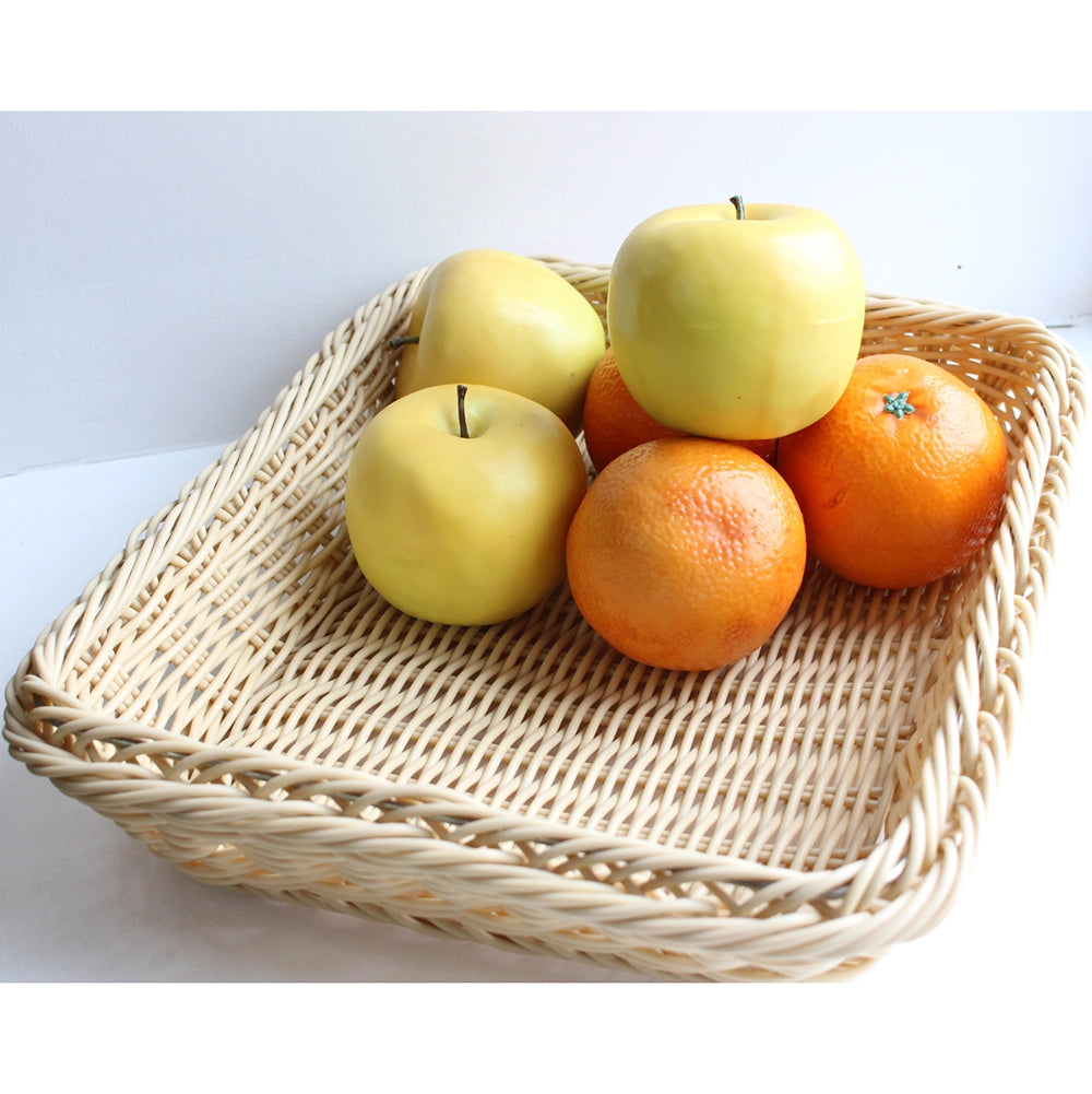 Close up of Wickerware rattan display basket with some fruit displayed