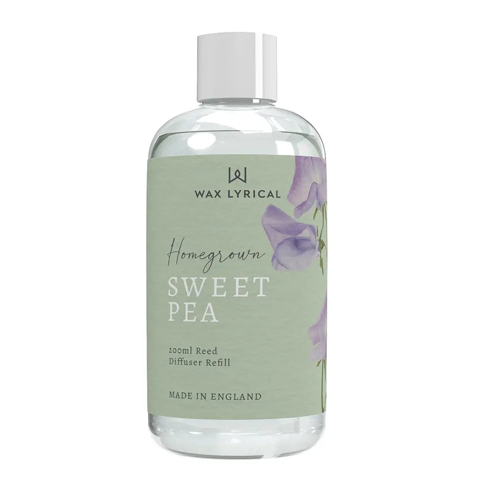 Wax Lyrical Homegrown Reed Diffuser Sweet Pea 200ml Refill - A 200ml clear refill bottle for a reed diffuser with 'Homegrown Sweet Pea' text and indigo floral illustrations on the label.