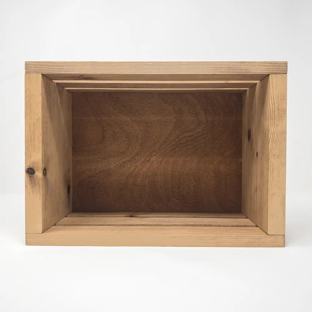 Inside of welcome box with a rustic finish on a white background
