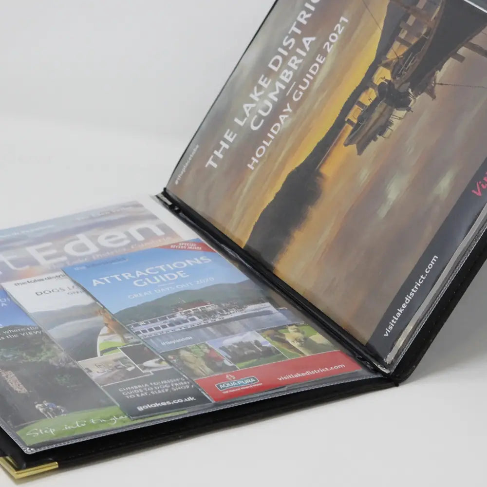 Faux black leather guest information folder open