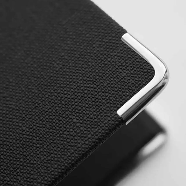 Close-up of metallic corner detail on Textured Guest Information Folder