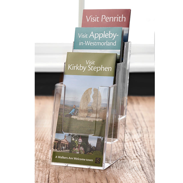 Clear acrylic tiered stand displaying 3 x 1/3 A3 folded leaflets