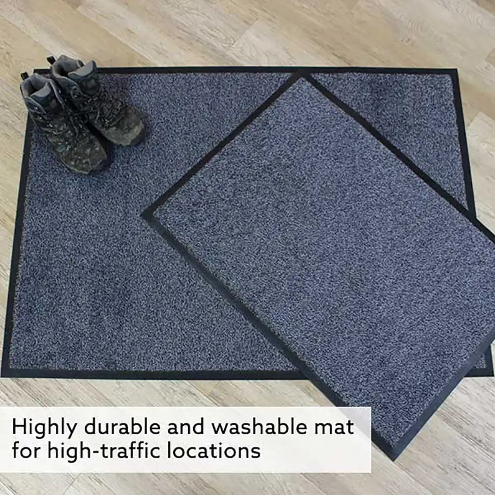 Washable dirt-absorbing nylon entrance mats are extremely durable with tough borders to resist tears on a wooden floor with shoes on one of them, text indicating durability and washability.