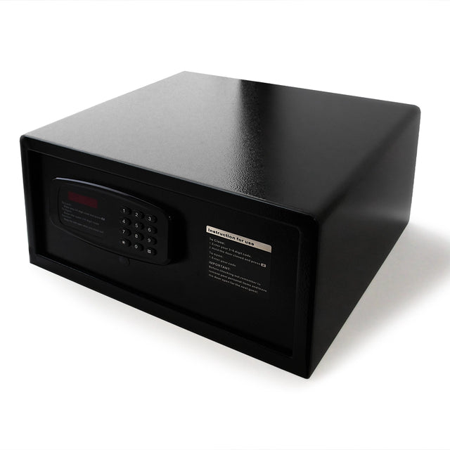 Black safe box with digital keypad on a white background