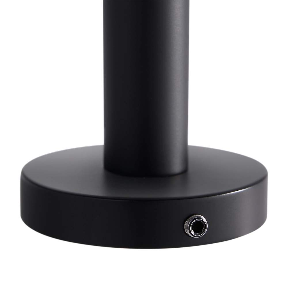 Black toilet roll holder fitting on a white background