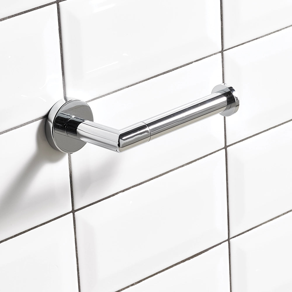 Chrome toilet roll holder pictured on a white tiled wall