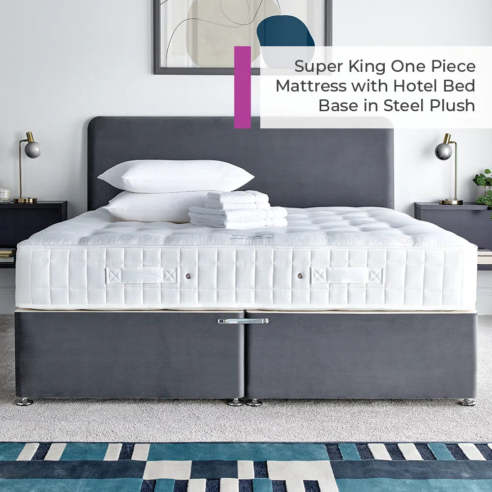 Super King one piece mattress with hotel bed base in steel plush in a bedroom setting.