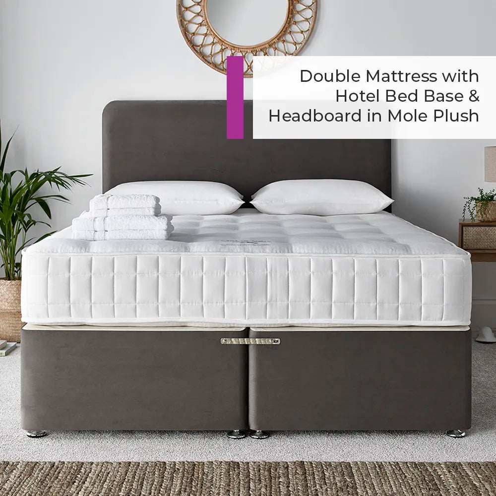 Double mattress with hotel bed base and headboard in mole plush in a room setting.