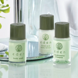 Eden hotel toiletries range – body wash, hand and body lotion, and conditioning shampoo bottles on bathroom shelf