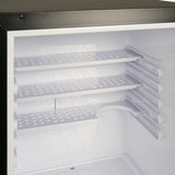 Empty refrigerator shelves inside a freezer