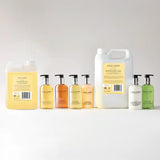 Collection of Cole & Lewis bath and body products on a white background
