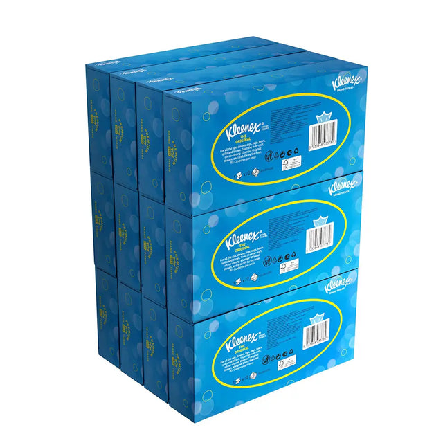 Stack of Kleenex facial tissue boxes on a white background