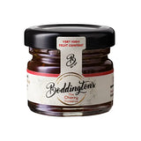 Jar of Boddington's Cherry Conserve with a black lid on a white background