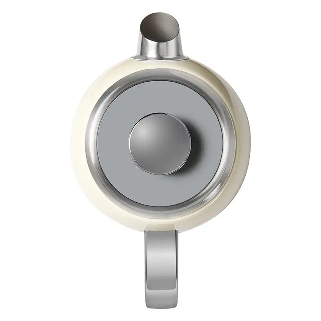 Cream kettle with a handle on a white background