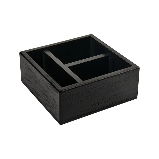 Black wooden holder with compartments on a white background