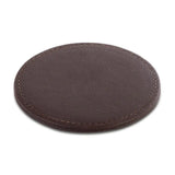 Round brown leather-effect coaster on a white background