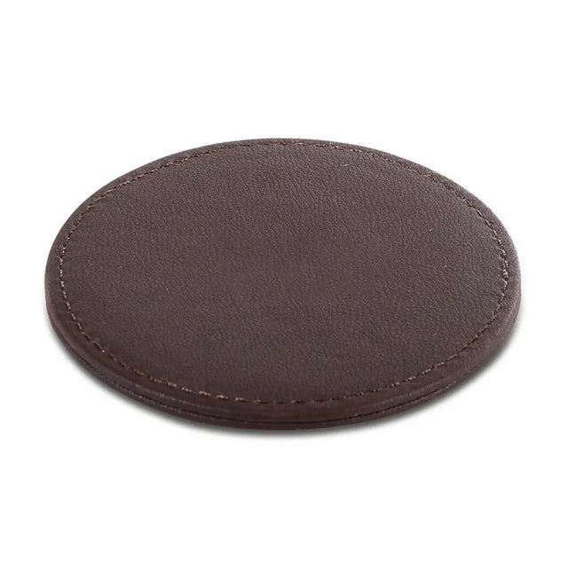 Round brown leather-effect coaster on a white background