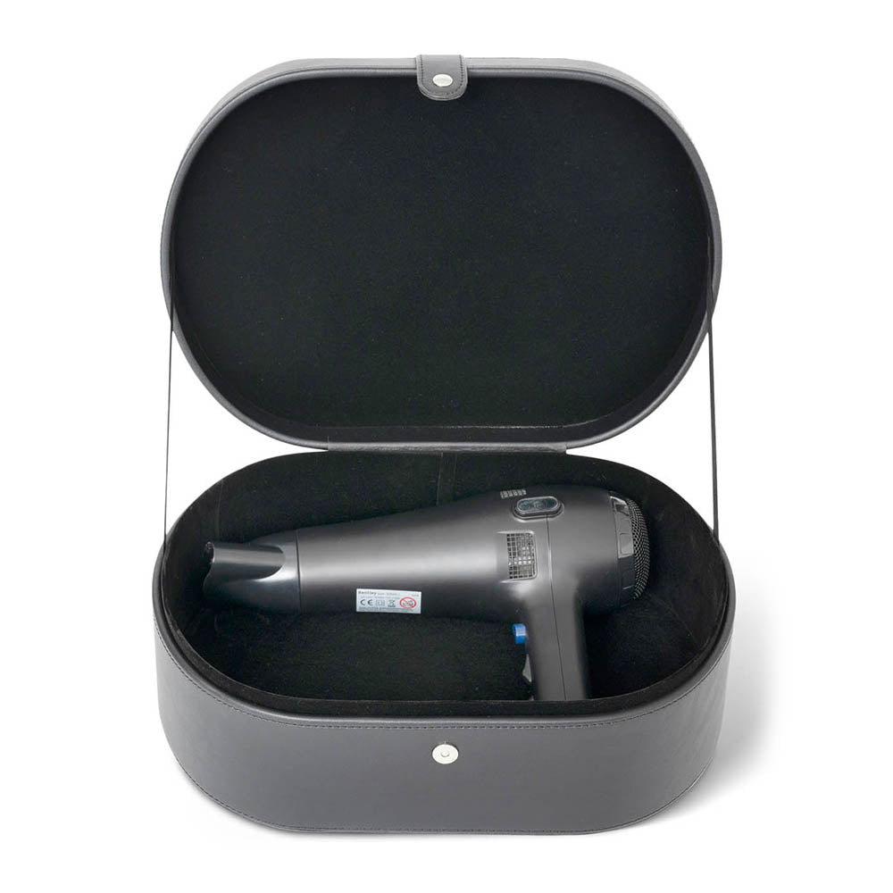 Hair dryer in a black storage case on a white background