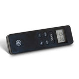 Black remote control with digital display on a white background