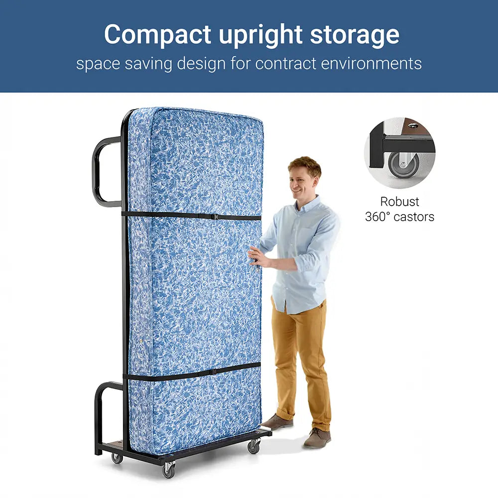 An upright hotel bed with a person demonstrating its size and features.