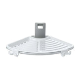 Corner shower caddy with white tray and gray hooks on a white background