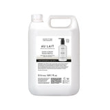 A 5 litre white plastic container of Scottish Soaps Au Lait Hair & Body Wash Refill, featuring a white label with black text and a small product photo, on a solid white background.