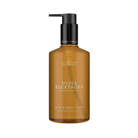 A bottle of Scottish Fine Soaps Silver Buckthorn Hair & Body Wash, featuring an amber-brown translucent bottle and a black pump dispenser, set against a plain white background.