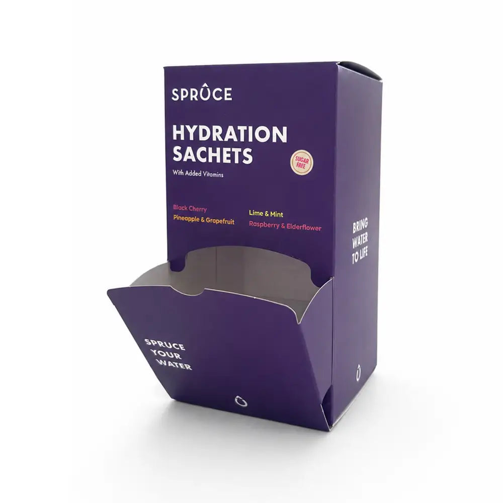 Spruce Hydration Sachets purple display box, sugar-free water flavouring with added vitamins, four flavours listed