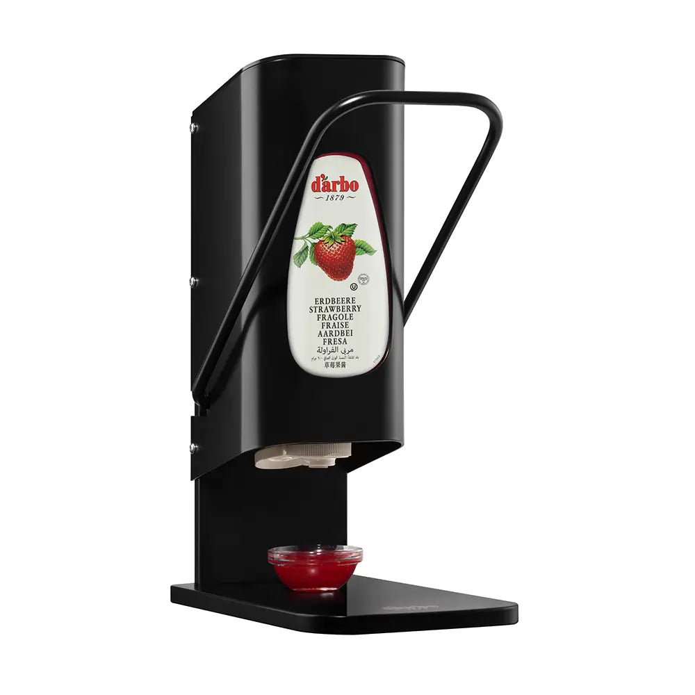 Darbo jam dispenser with lever, black stand, shown dispensing into a small bowl
